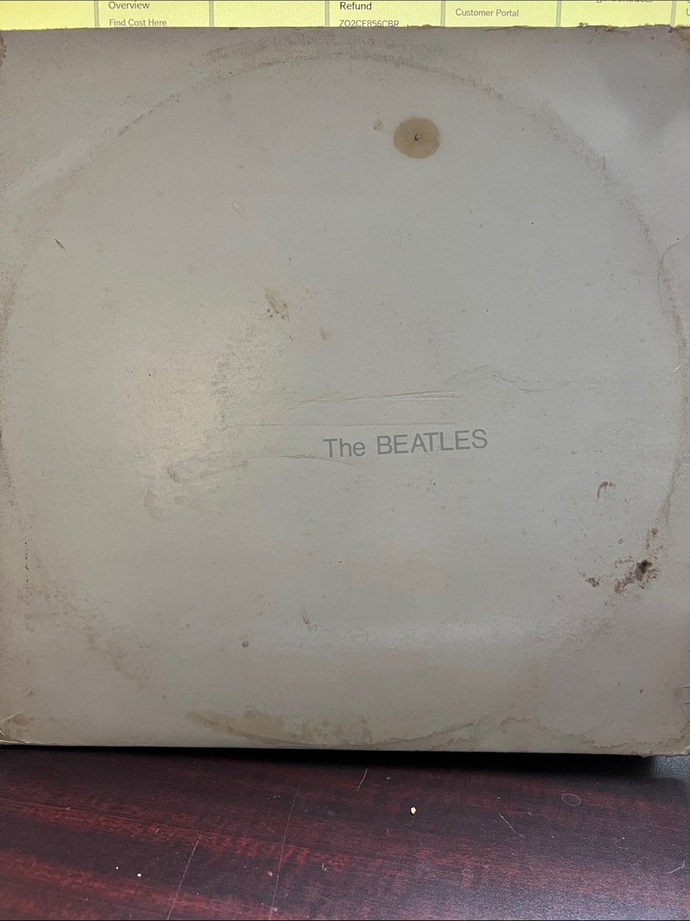 The Beatles White Minimalist Album Cover with Subtle Gray Text